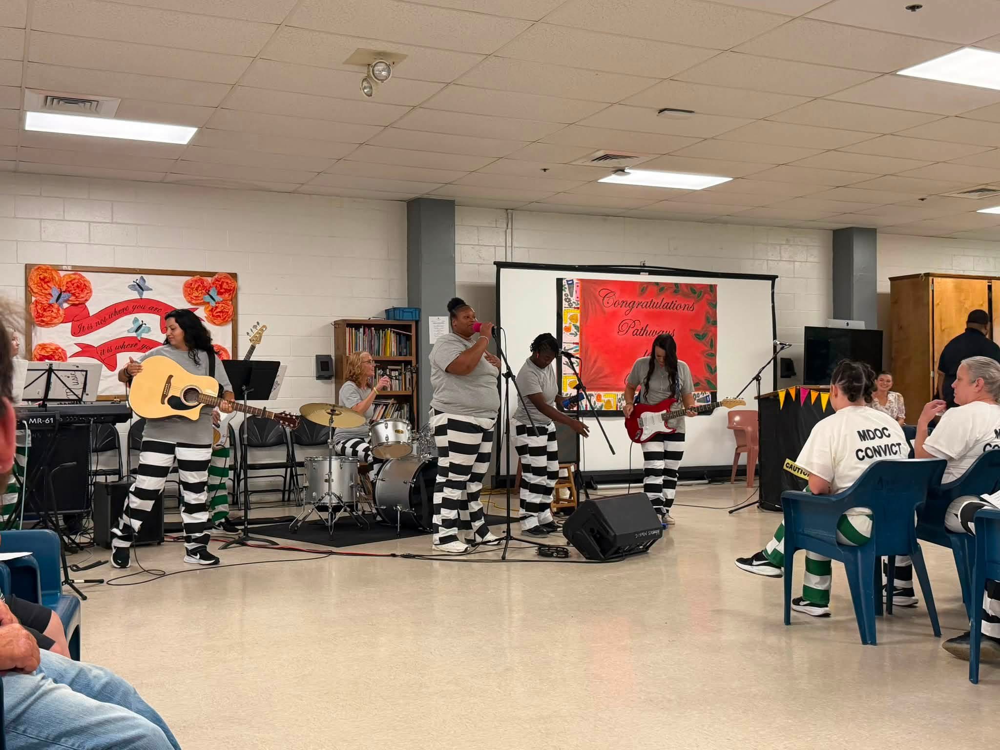 The 10-99 band performing at the graduation ceremony