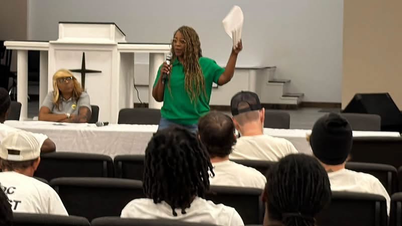 An MIC speaker addressing men at the Mississippi Parole Project launch at Parchman